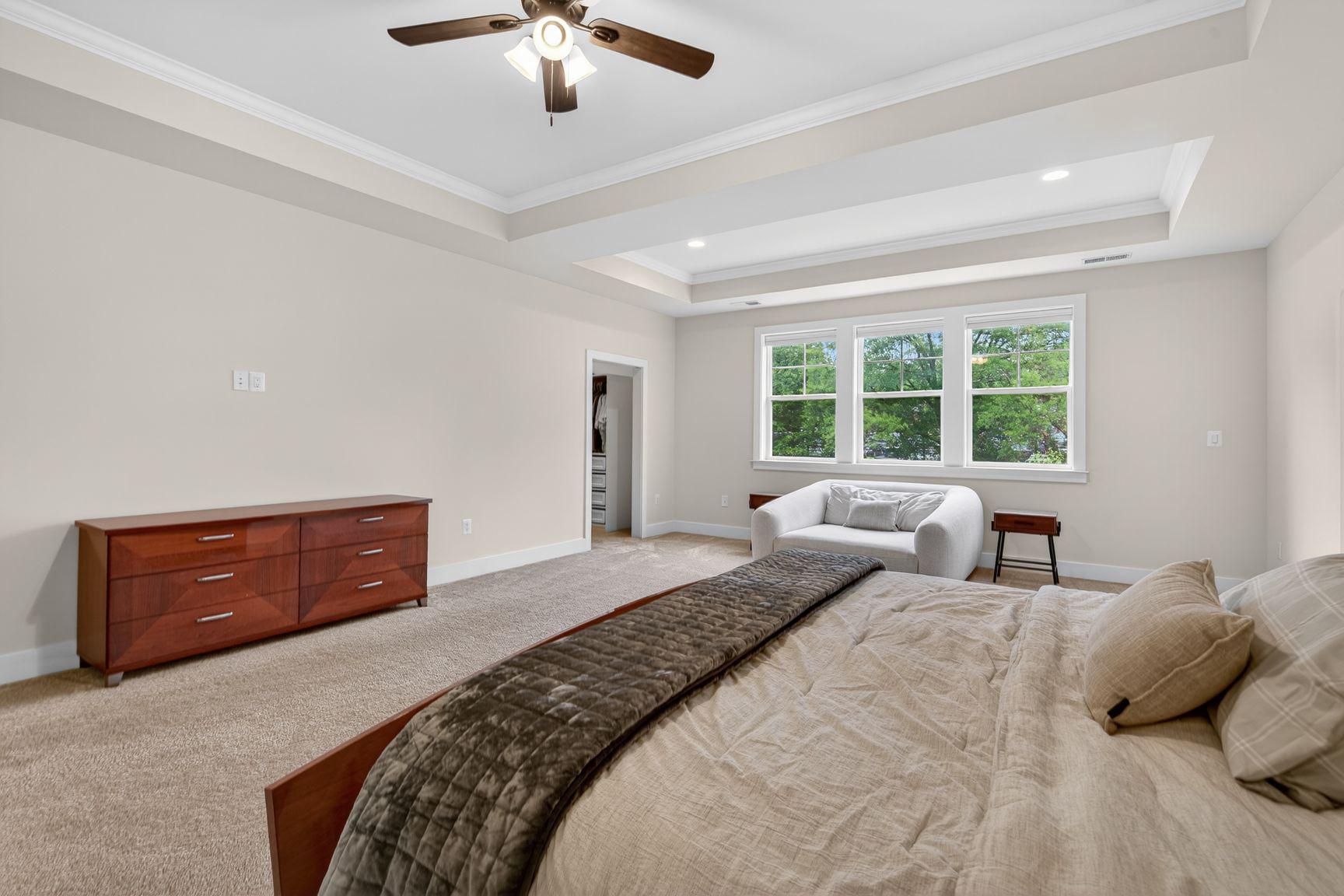6213 Mcconnell Lane Springfield, VA 22152 - Photo 18 of 39 a bedroom with a large bed and a window