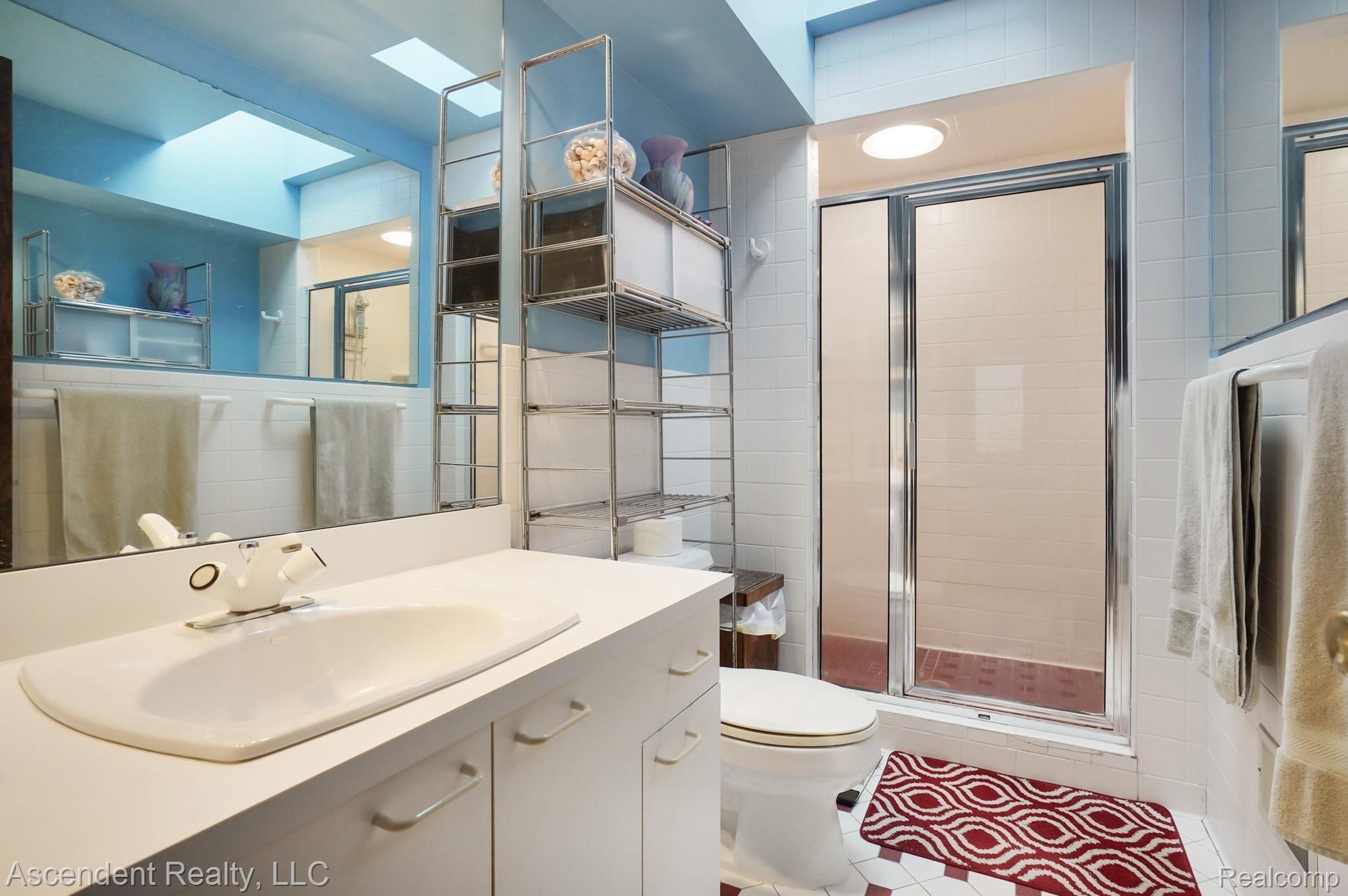 3075 Walnut Lake Road West Bloomfield, MI 48322 - Photo 22 of 39 Master bathroom with fully tiled stall shower