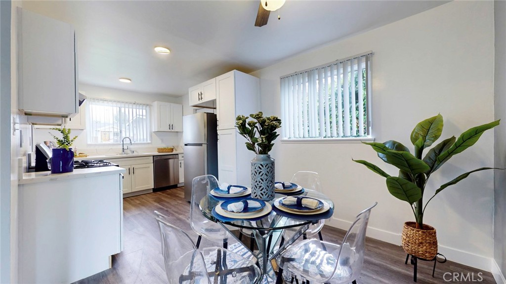 10915 Eldora Avenue Sunland, CA 91040 - Photo 11 of 39 a view of a dining room with furniture and a potted plant