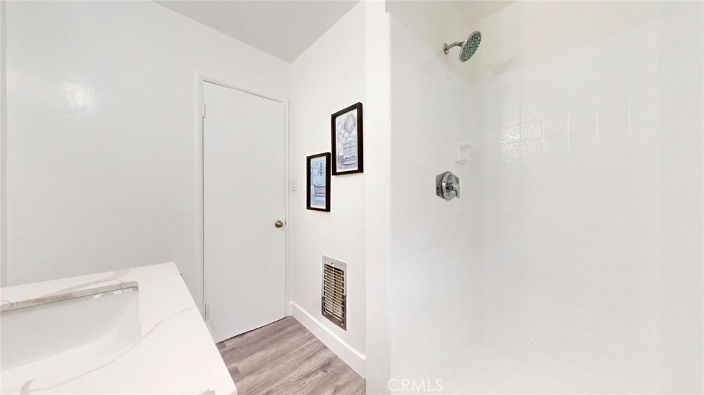 10915 Eldora Avenue Sunland, CA 91040 - Photo 20 of 39 a bathroom with a bathtub and shower