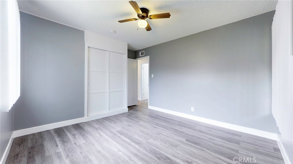 10915 Eldora Avenue Sunland, CA 91040 - Photo 24 of 39 wooden floor in an empty room with a window