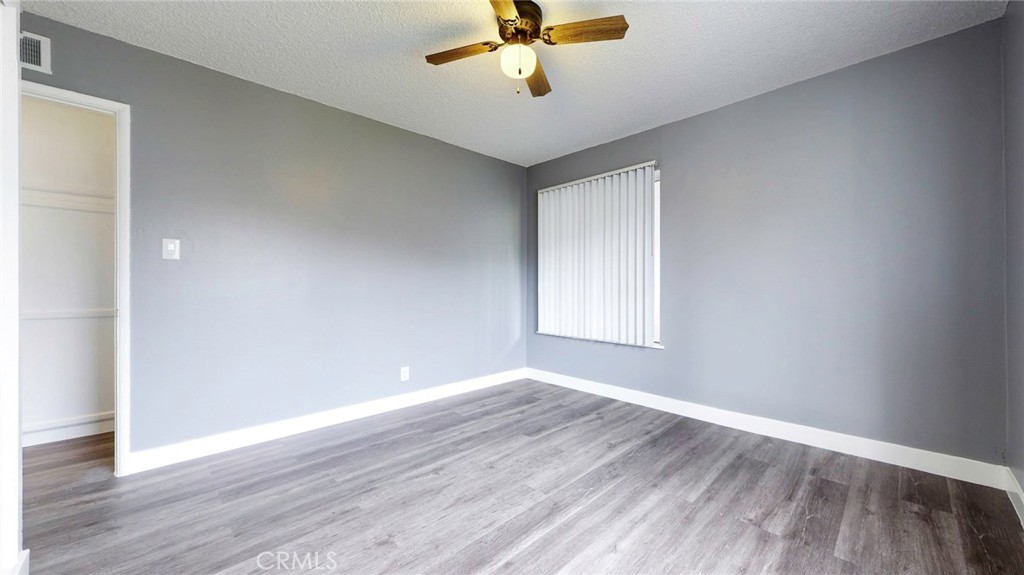 10915 Eldora Avenue Sunland, CA 91040 - Photo 25 of 39 wooden floor in an empty room with a window