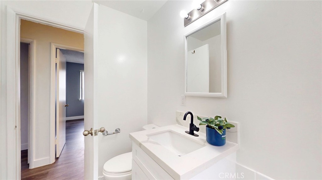 10915 Eldora Avenue Sunland, CA 91040 - Photo 26 of 39 a bathroom with a sink and toilet