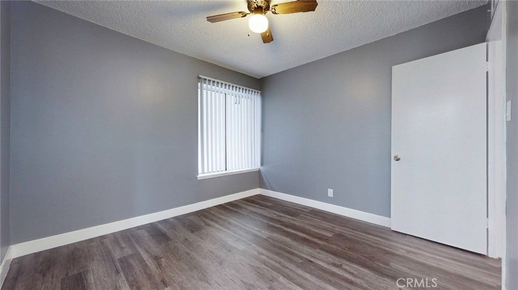 10915 Eldora Avenue Sunland, CA 91040 - Photo 29 of 39 wooden floor in an empty room with a window
