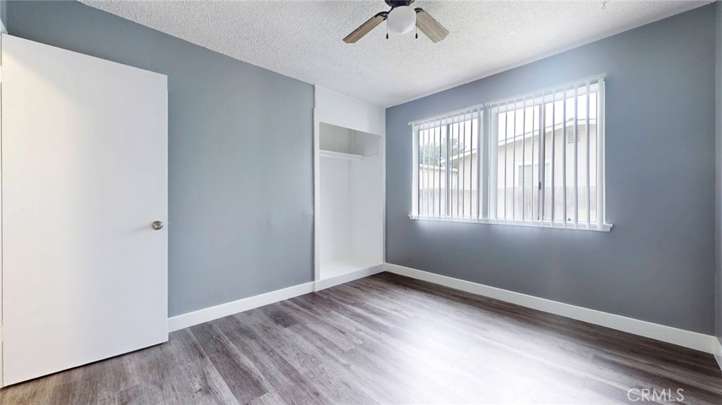 10915 Eldora Avenue Sunland, CA 91040 - Photo 31 of 39 a view of room with window and hardwood floor
