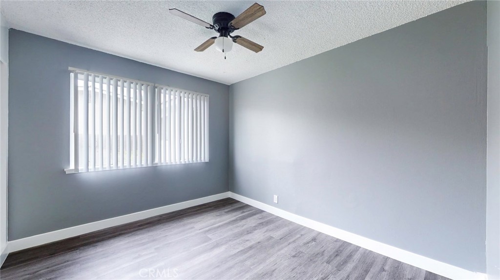 10915 Eldora Avenue Sunland, CA 91040 - Photo 34 of 39 a view of a big room with wooden floor and windows