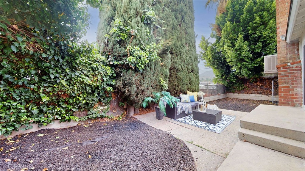 10915 Eldora Avenue Sunland, CA 91040 - Photo 35 of 39 a view of a backyard with sitting area
