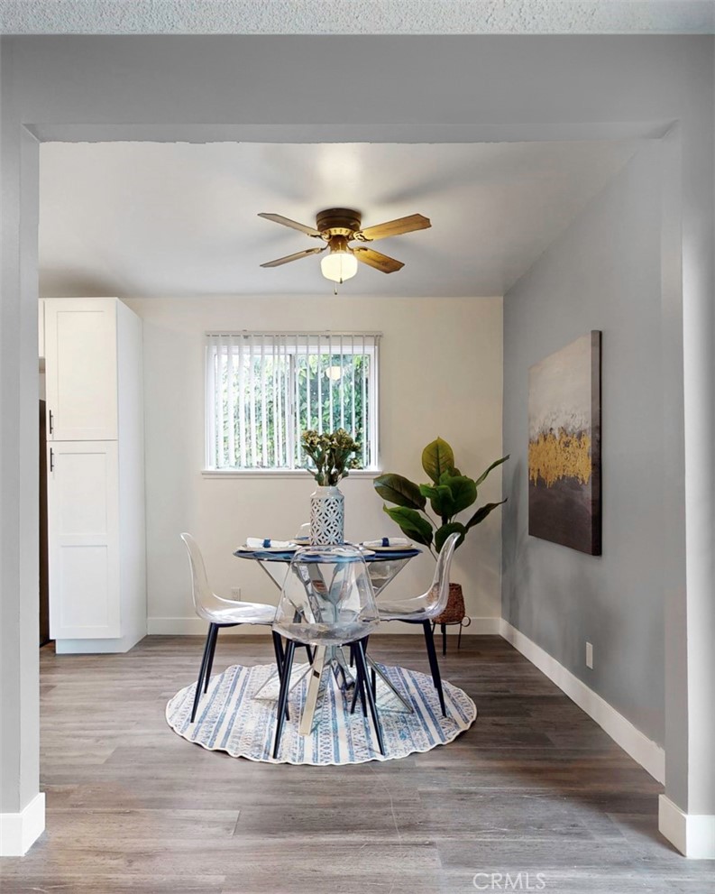 10915 Eldora Avenue Sunland, CA 91040 - Photo 10 of 39 a view of a dining room with furniture window and wooden floor