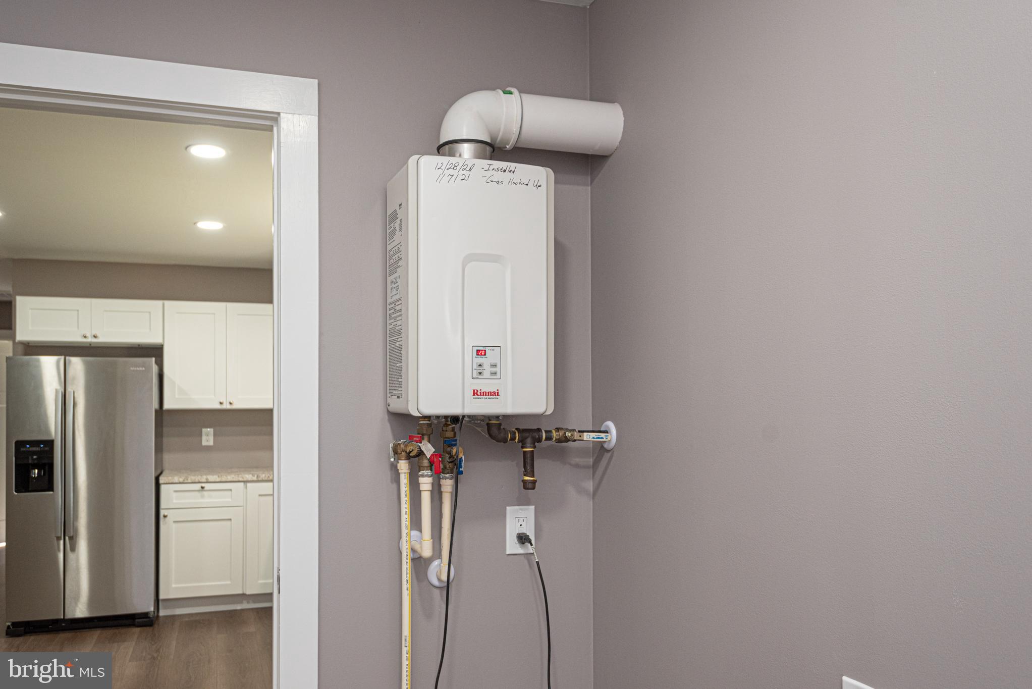 8142 Burnt Mill Road Willards, MD 21874 - Photo 31 of 44 TANKLESS HOT WATER HEATER