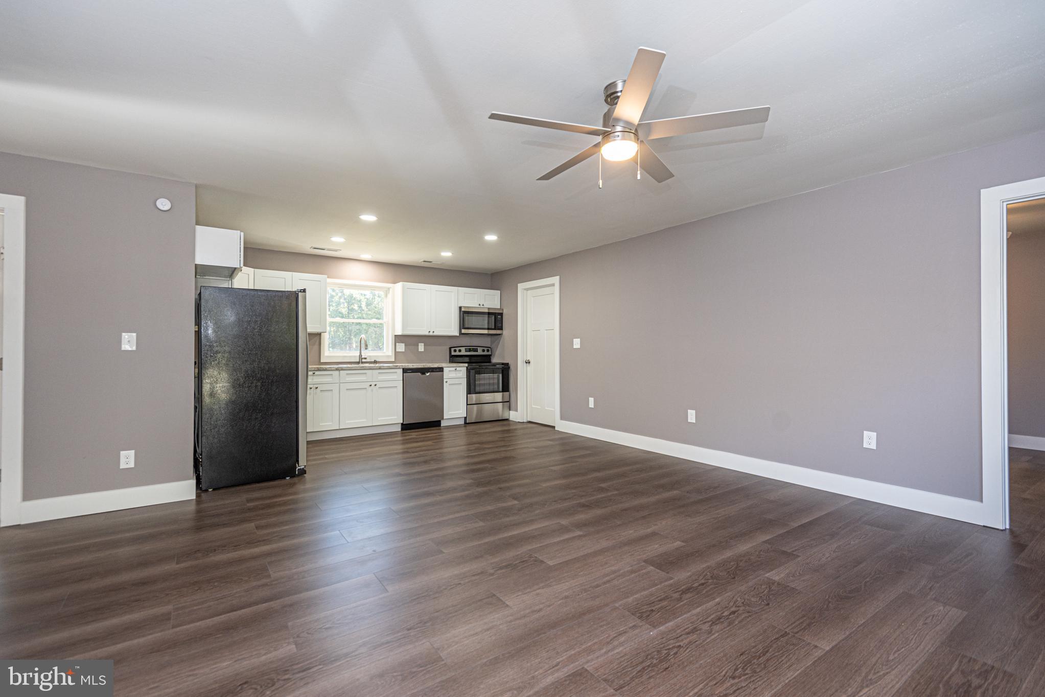 8142 Burnt Mill Road Willards, MD 21874 - Photo 9 of 44 LIVING ROOM VIEW TO KITCHEN