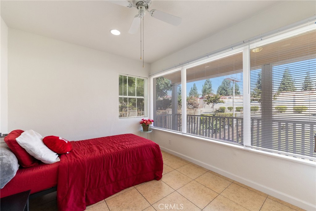 1312 West Commonwealth Avenue Fullerton, CA 92833 - Photo 14 of 39 a bed room with a bed and a large window