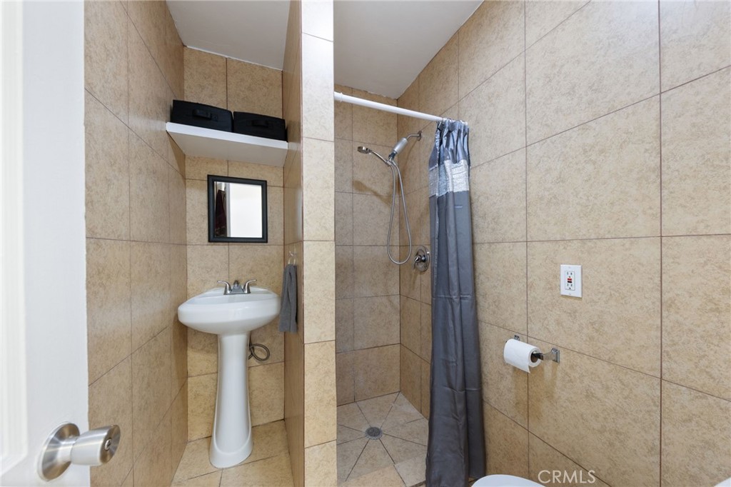 1312 West Commonwealth Avenue Fullerton, CA 92833 - Photo 19 of 39 a bathroom with a shower