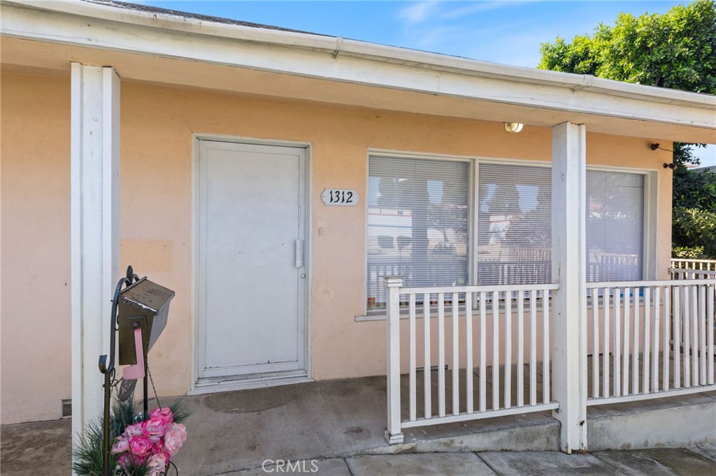 1312 West Commonwealth Avenue Fullerton, CA 92833 - Photo 39 of 39 a view of a porch with a small yard