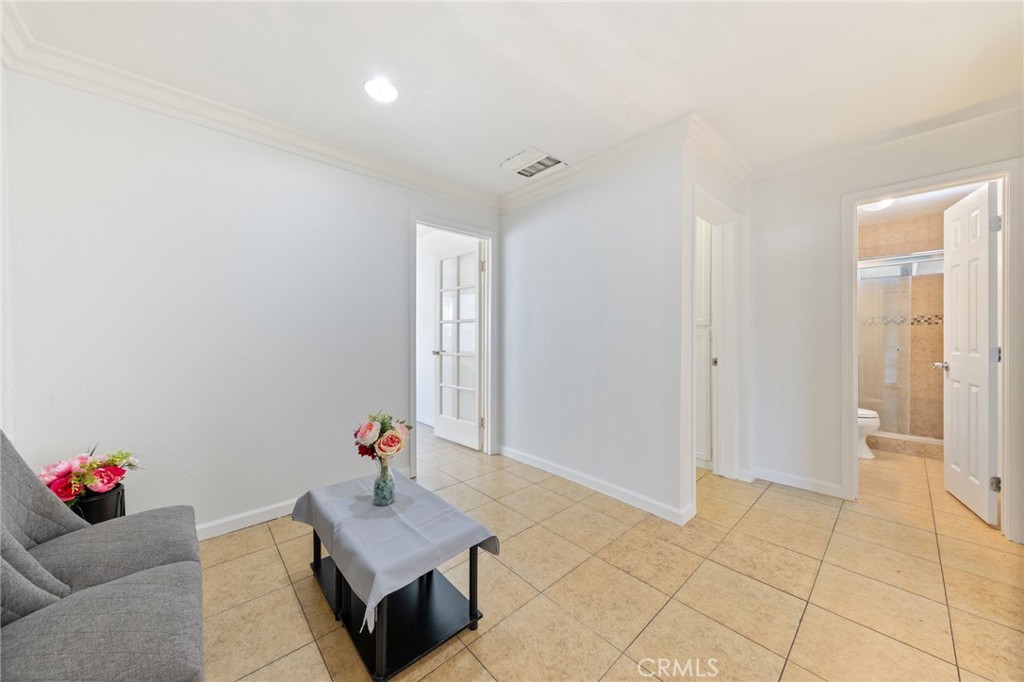 1312 West Commonwealth Avenue Fullerton, CA 92833 - Photo 8 of 39 a living room with furniture and flowers