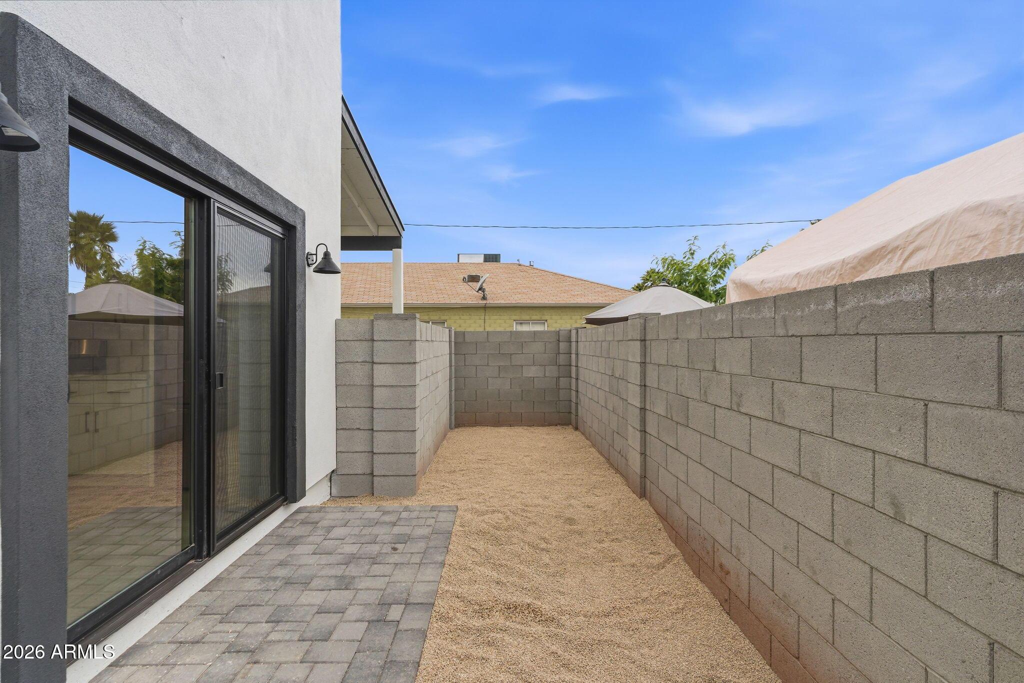 1222 East Diamond Street, Unit 2 Phoenix, AZ 85006 - Photo 17 of 35 a view of parking space in front of a building