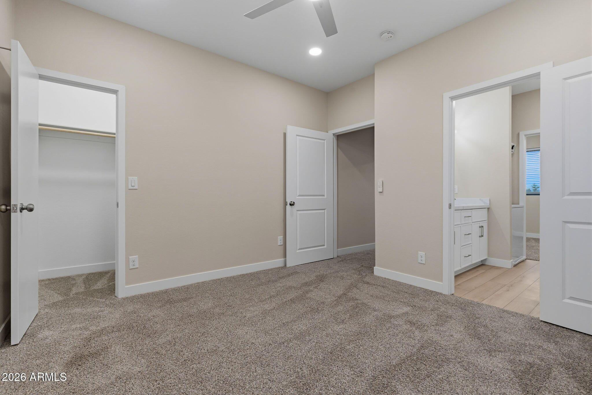 1222 East Diamond Street, Unit 2 Phoenix, AZ 85006 - Photo 20 of 35 an empty room with closet and a bathroom