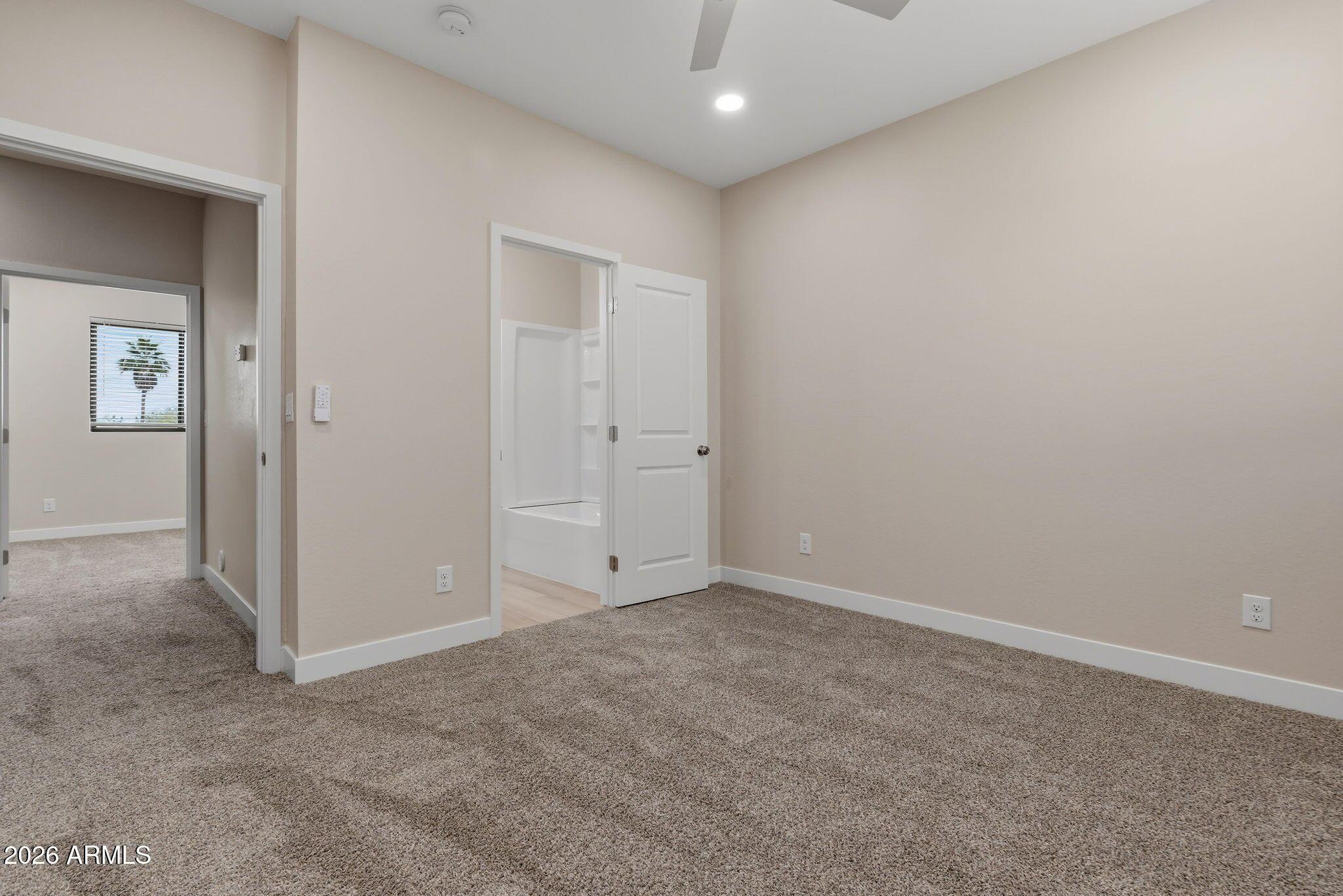 1222 East Diamond Street, Unit 2 Phoenix, AZ 85006 - Photo 22 of 35 an empty room with closet area
