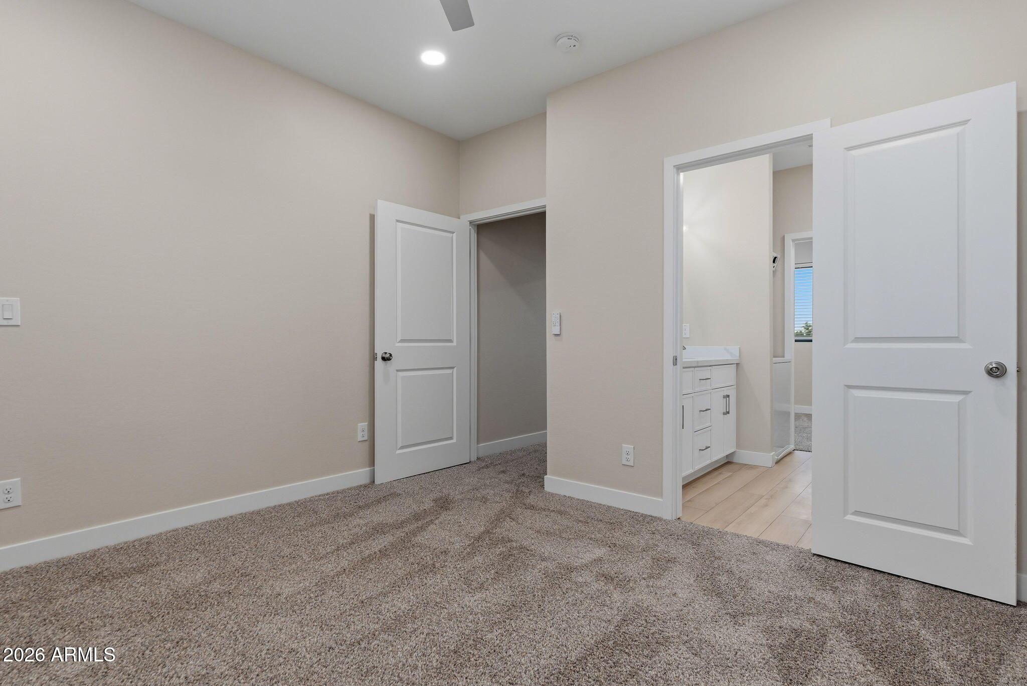 1222 East Diamond Street, Unit 2 Phoenix, AZ 85006 - Photo 23 of 35 an empty room with closet area