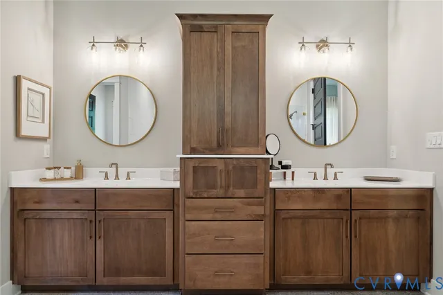 a bathroom with a double vanity sink and a mirror