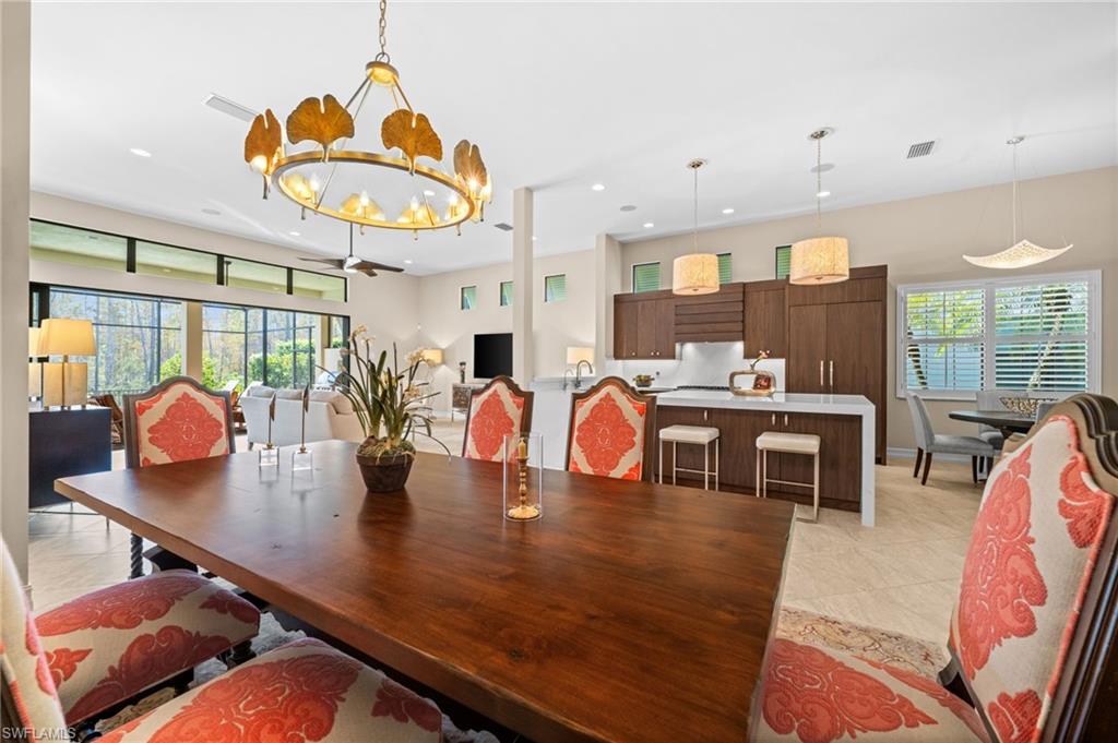 14686 Reserve Place Naples, FL 34109 - Photo 13 of 48 From dinner parties to cozy nights in, this flowing living space is made for memorable moments