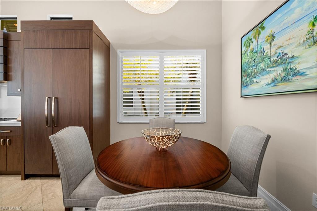 14686 Reserve Place Naples, FL 34109 - Photo 17 of 49 a view of a room with furniture and a window