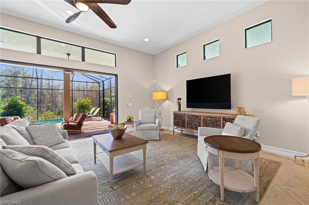 14686 Reserve Place Naples, FL 34109 - Photo 6 of 48 Indoor-outdoor living at its finest, bright, spacious, and designed for effortless relaxation.