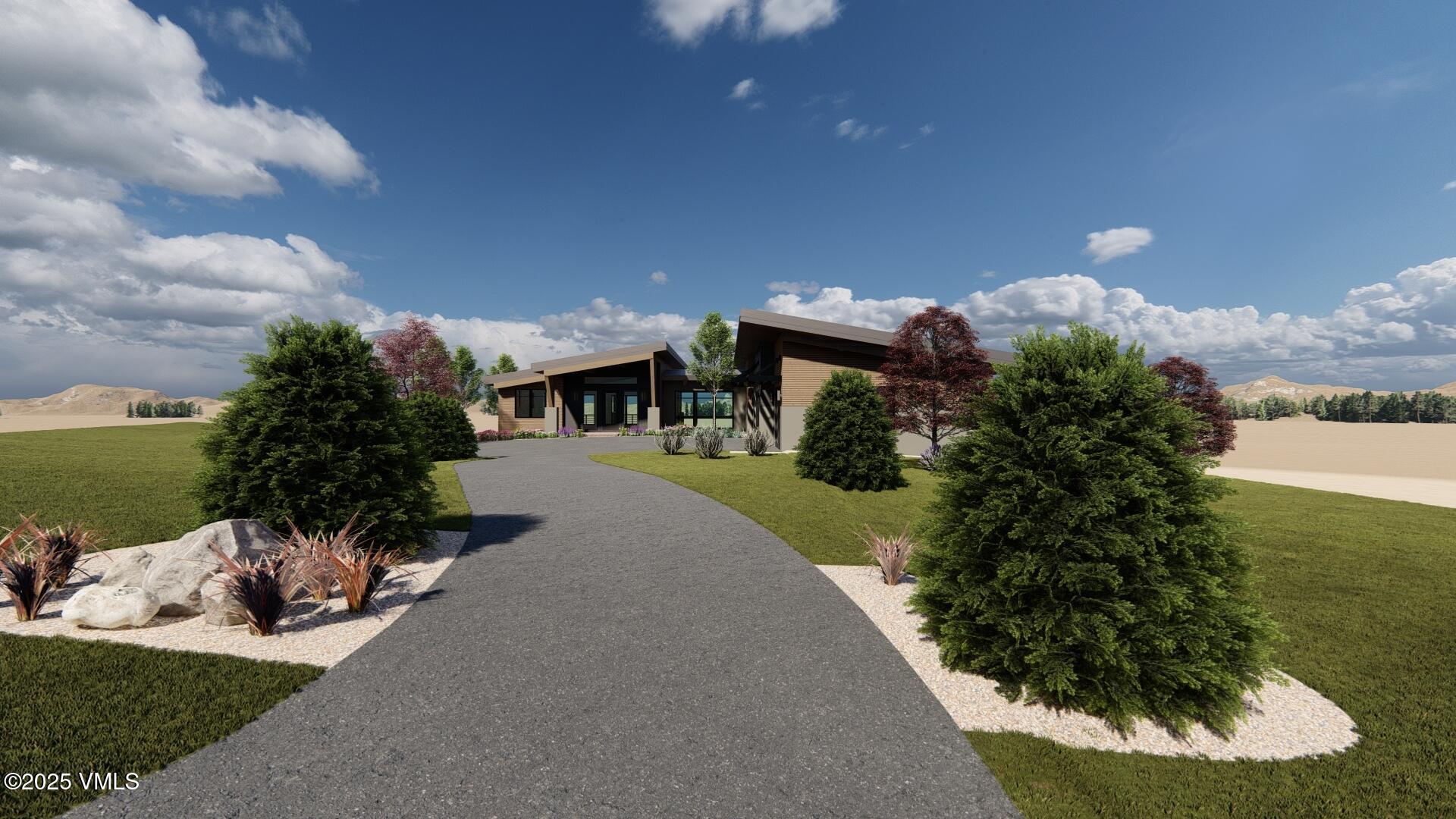 61 New York Mountain Road Eagle, CO 81631 - Photo 17 of 18 a front view of a house with a yard and garage