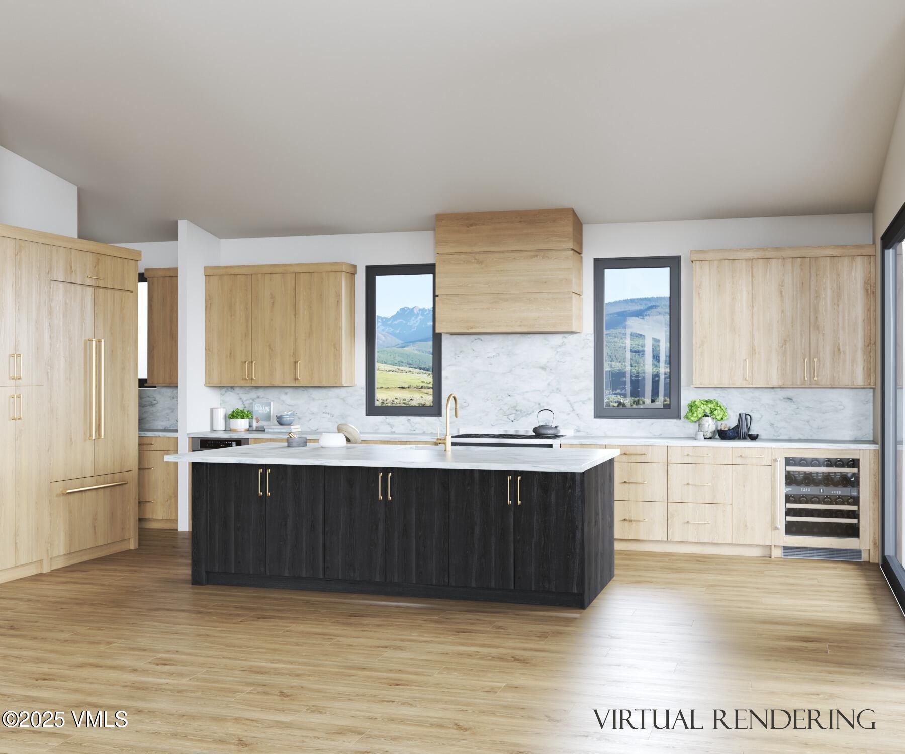 61 New York Mountain Road Eagle, CO 81631 - Photo 3 of 18 a large kitchen with kitchen island a sink stainless steel appliances and cabinets