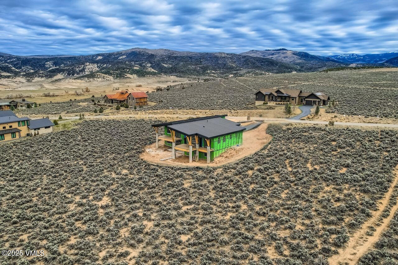 61 New York Mountain Road Eagle, CO 81631 - Photo 5 of 18 a view of a lake with a mountain