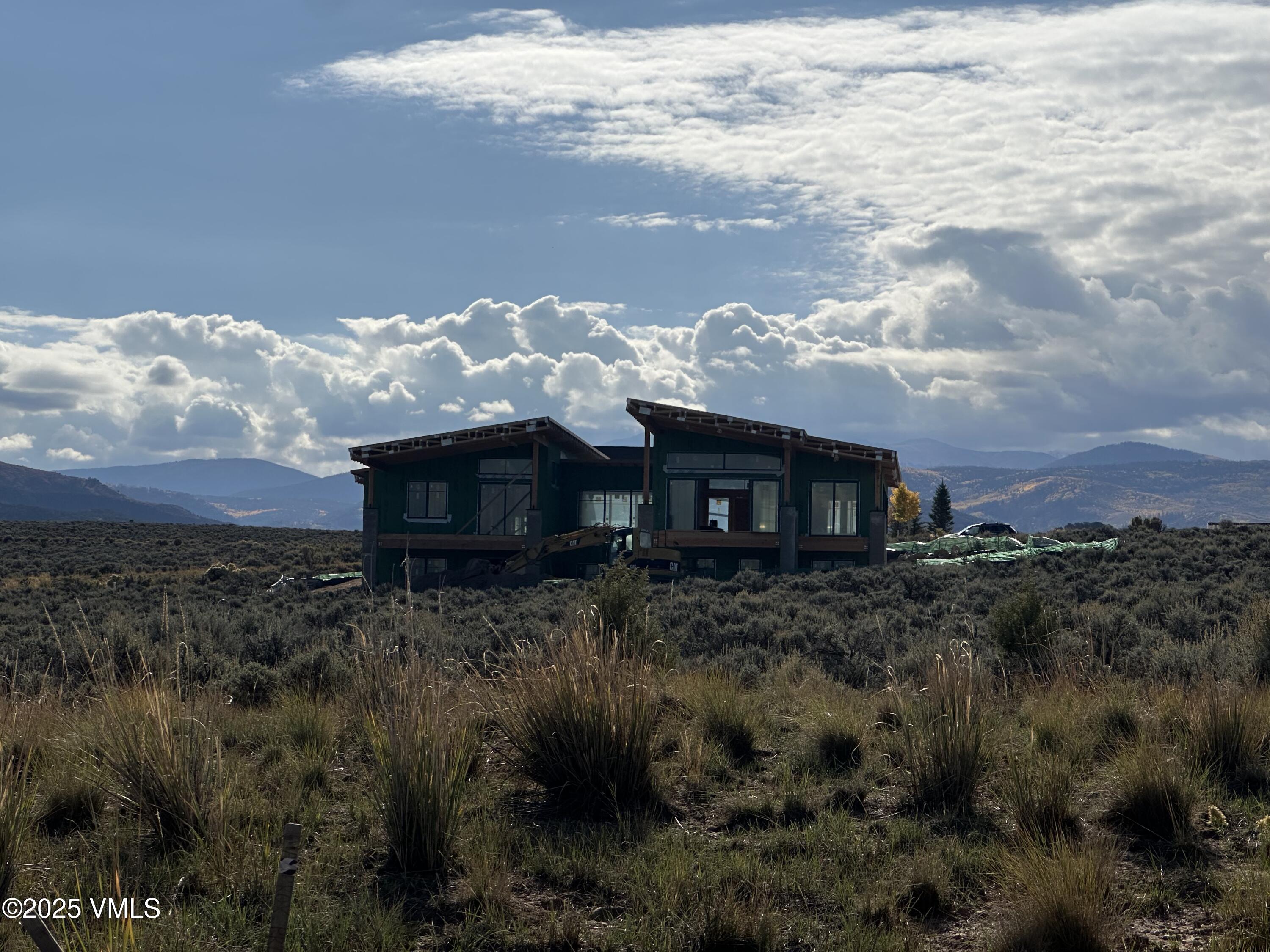 61 New York Mountain Road Eagle, CO 81631 - Photo 6 of 18 a view of a house with a yard