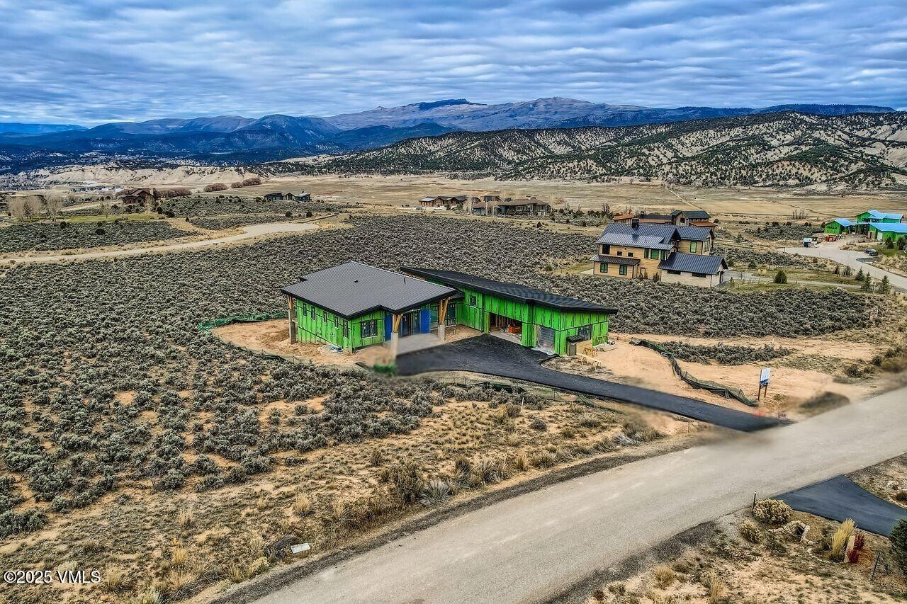 61 New York Mountain Road Eagle, CO 81631 - Photo 7 of 18 a view of a backyard with a ocean view