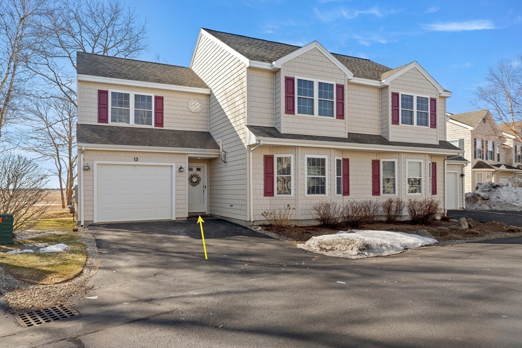 188 Beach Road, Unit 15 Salisbury, MA 01952 - Photo 1 of 39 a front view of a house with a yard