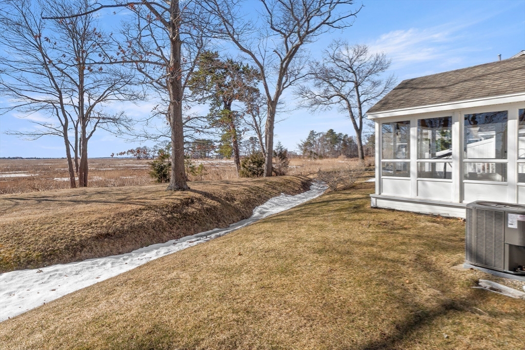 188 Beach Road, Unit 15 Salisbury, MA 01952 - Photo 27 of 39 a view of a yard with large trees