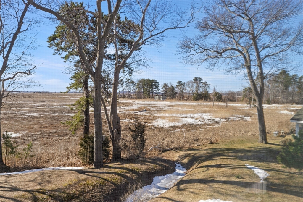 188 Beach Road, Unit 15 Salisbury, MA 01952 - Photo 29 of 39 a view of a yard with an ocean view