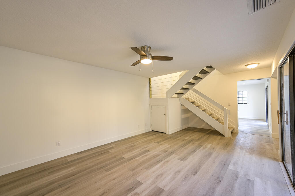356 Prestwick Circle, Unit 3 Palm Beach Gardens, FL 33418 - Photo 16 of 42 a view of an empty room with a window