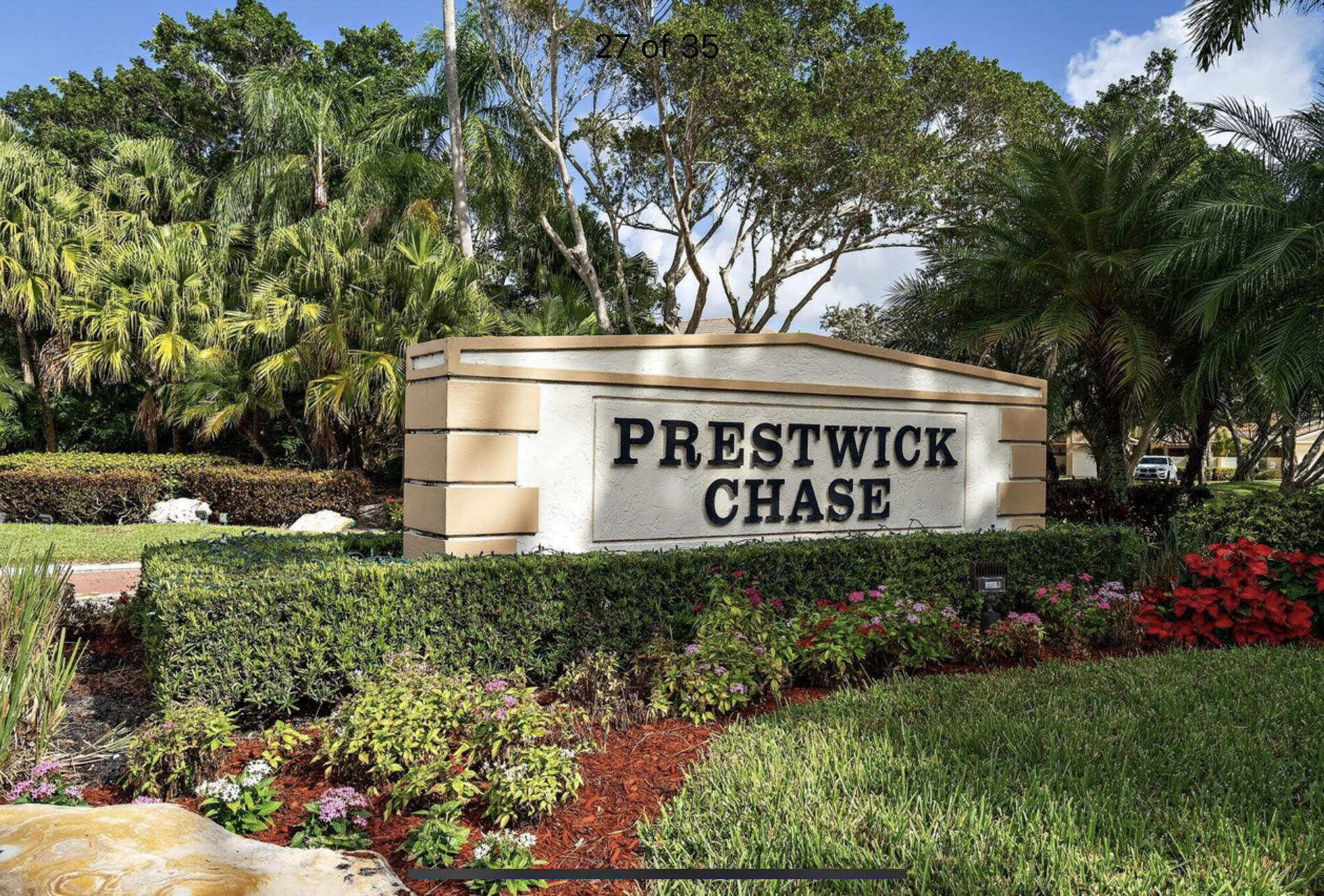 356 Prestwick Circle, Unit 3 Palm Beach Gardens, FL 33418 - Photo 32 of 42 a sign on the side of a building