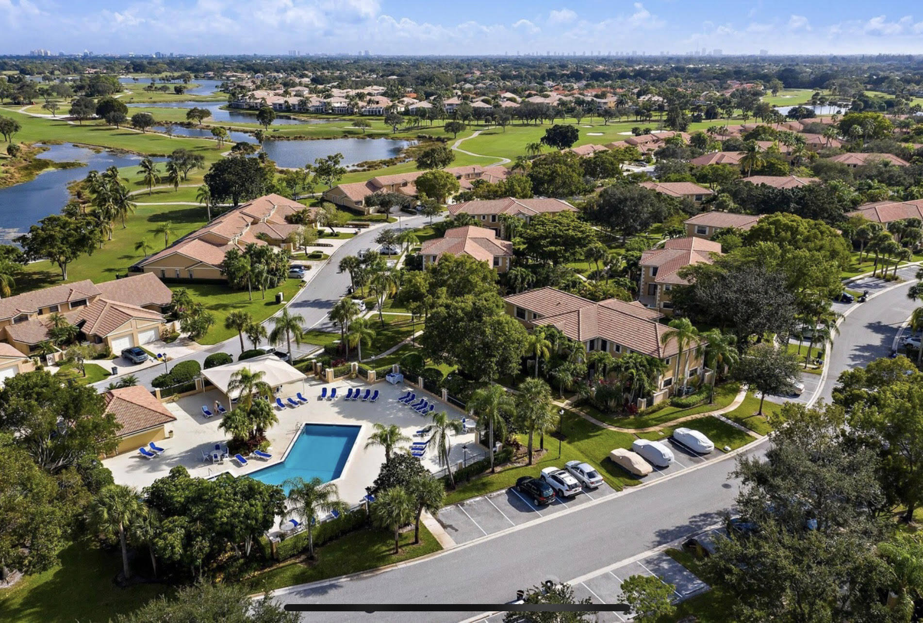356 Prestwick Circle, Unit 3 Palm Beach Gardens, FL 33418 - Photo 35 of 42 an aerial view of residential houses with outdoor space