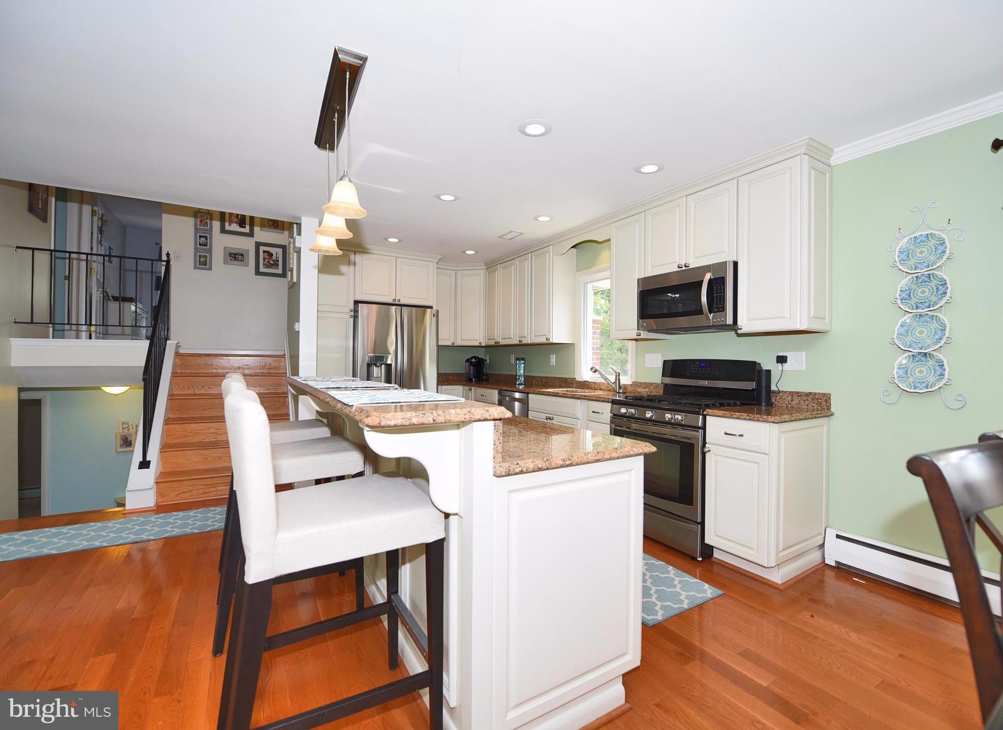 607 Seabrook Road Towson, MD 21286 - Photo 7 of 30 Pendant lighting at breakfast bar/island