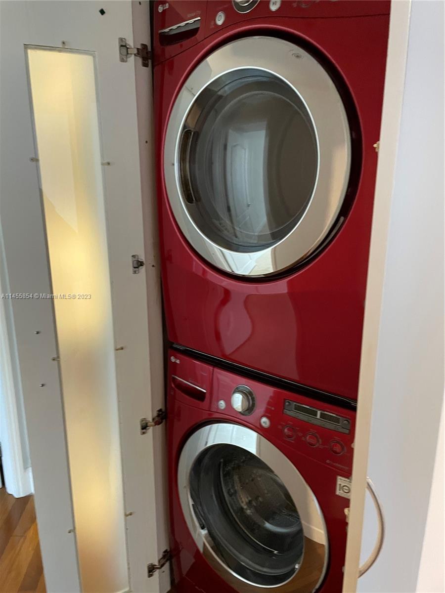 1900 Sunset Harbour Drive, Unit 1209 Miami Beach, FL 33139 - Photo 12 of 35 a utility room with dryer and washer