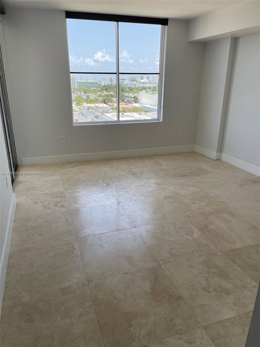 1900 Sunset Harbour Drive, Unit 1209 Miami Beach, FL 33139 - Photo 23 of 35 an empty room with a window