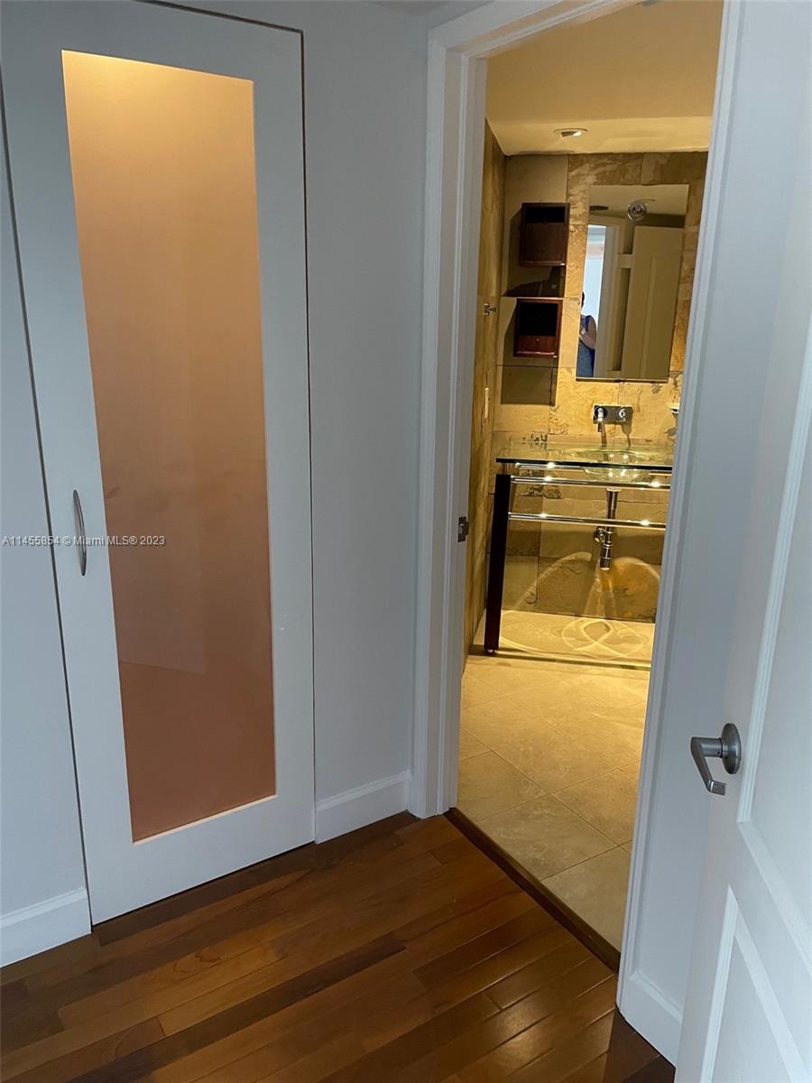 1900 Sunset Harbour Drive, Unit 1209 Miami Beach, FL 33139 - Photo 29 of 35 wooden floor in an empty room