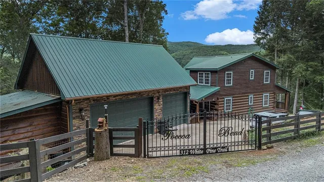 a view of a house with a roof deck