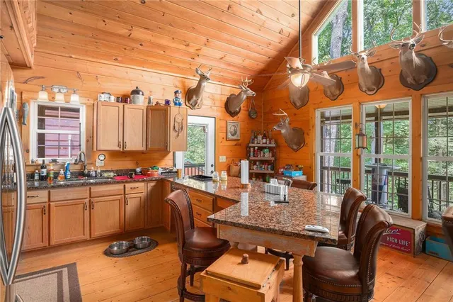a view of a chairs and table in a patio