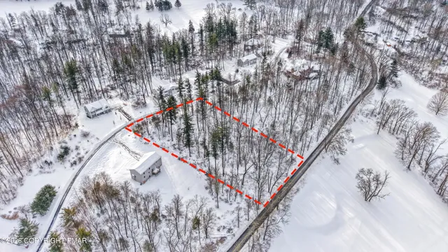 a view of entryway with wooden stairs