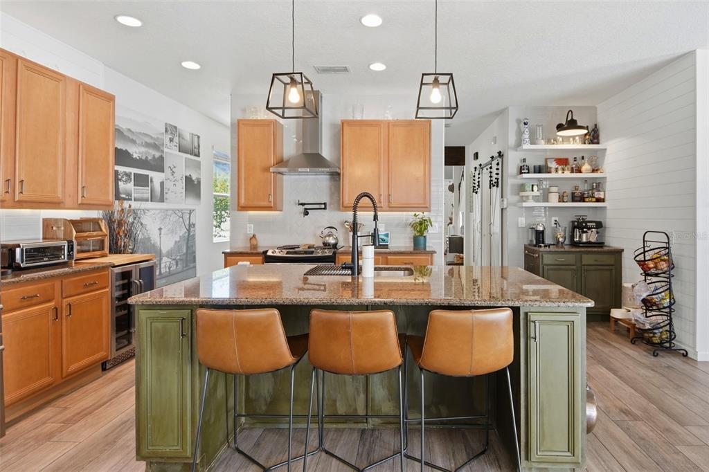 7519 Brofield Avenue Windermere, FL 34786 - Photo 12 of 49 a large kitchen with a table and chairs