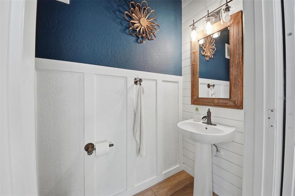7519 Brofield Avenue Windermere, FL 34786 - Photo 16 of 49 a bathroom with a sink and mirror