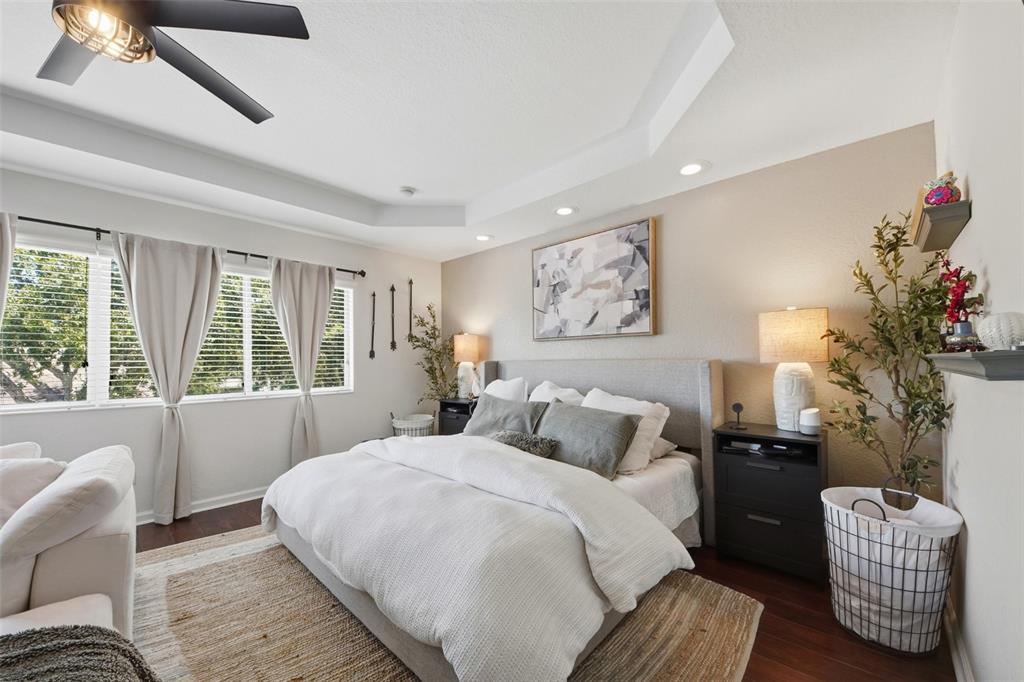 7519 Brofield Avenue Windermere, FL 34786 - Photo 19 of 49 a bedroom with bed and window