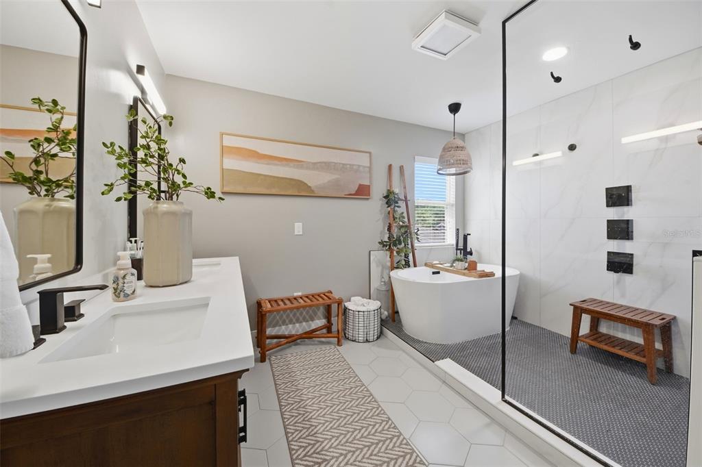 7519 Brofield Avenue Windermere, FL 34786 - Photo 23 of 49 a bathroom with a sink a toilet and shower