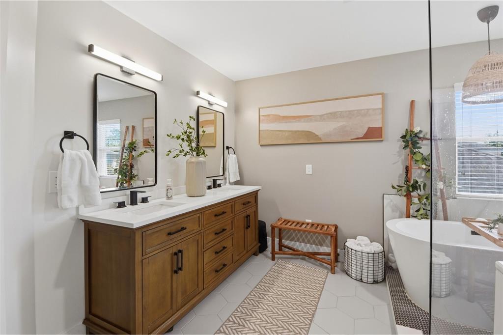 7519 Brofield Avenue Windermere, FL 34786 - Photo 25 of 49 a bathroom with a sink mirror and toilet