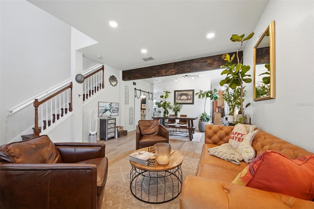 7519 Brofield Avenue Windermere, FL 34786 - Photo 5 of 49 a living room with furniture and a potted plant